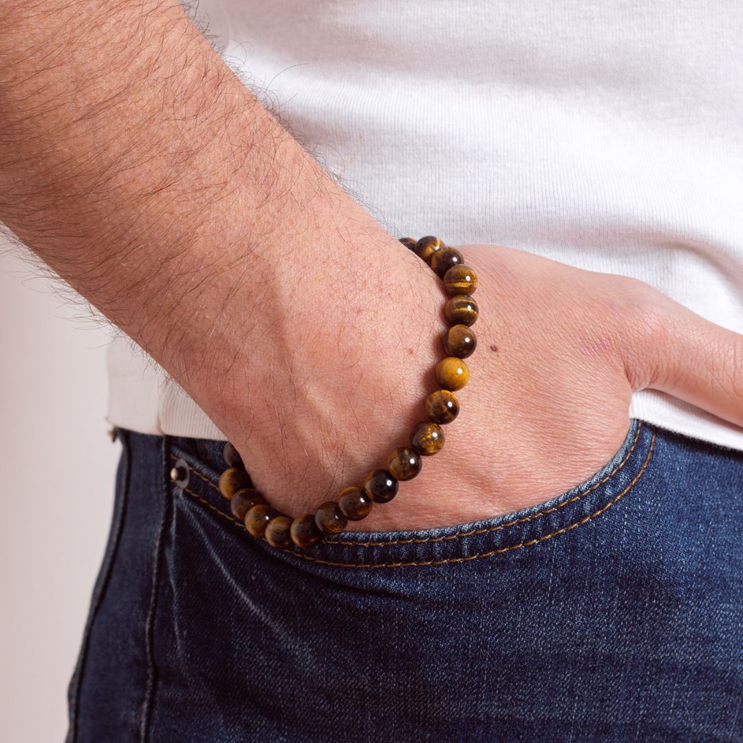 Man wearing Ambarya Courage - Tiger’s Eye crystal Mala Bead Bracelet 