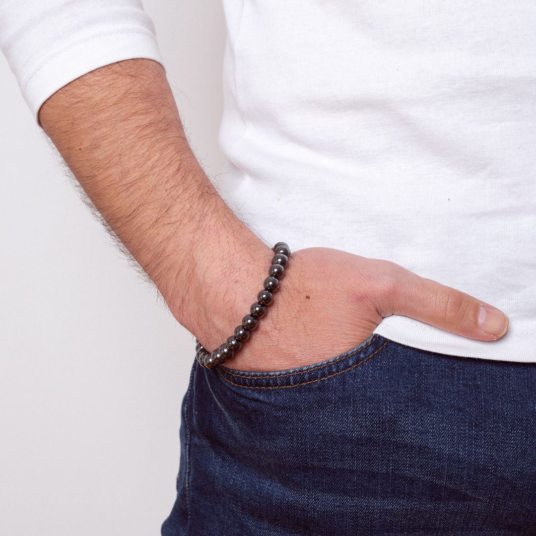 Man wearing Ambarya Strength - Hematite Mala Bead Bracelet