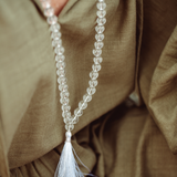 Close up of Clear Quartz crystal Mala Beads