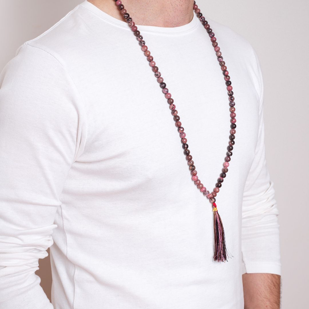 Close up of man wearing Ambarya Emotional Balance - Rhodonite crystal Mala Bead Necklace