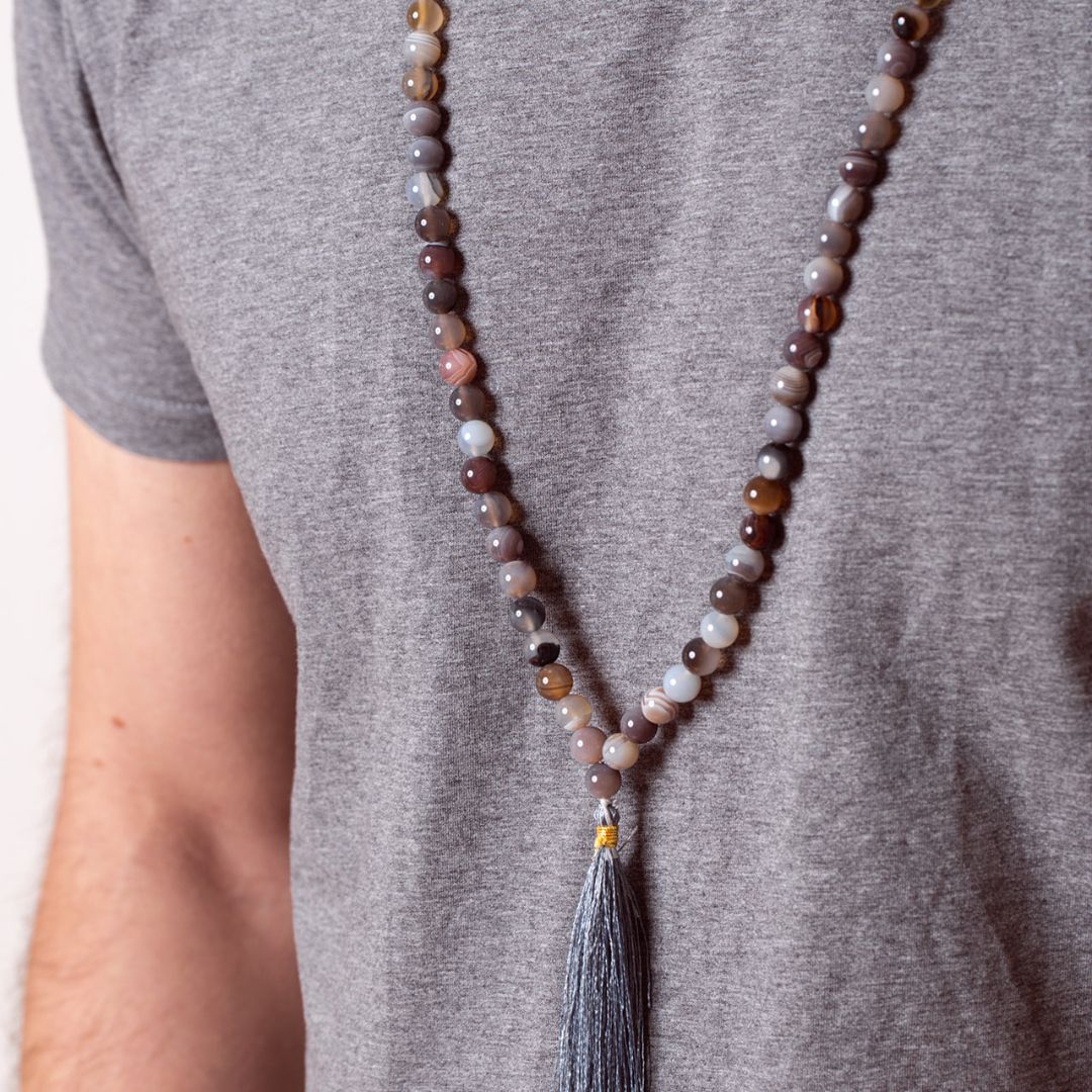 Man wearing Acceptance - Botswana Agate crystal Mala Bead Necklace