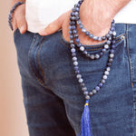 Man wearing Ambarya Insight - Sodalite Mala Bead Necklace wrapped around his wrist