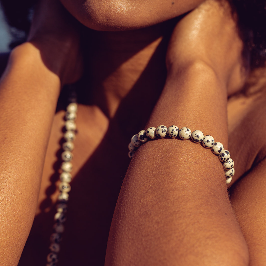 Close up of Ambarya Playfulness - Dalmation Stone Mala Bead Bracelet