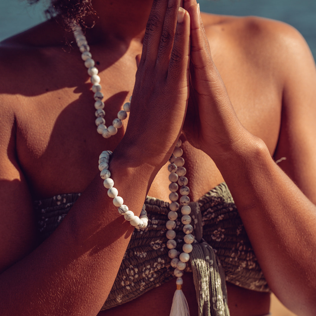 Close up of woman wearing Ambarya Patience - Howlite Mala Bead Set