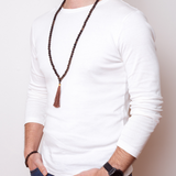Man wearing Ambarya Release - Smoky Quartz Mala Bead Necklace and Bracelet Set